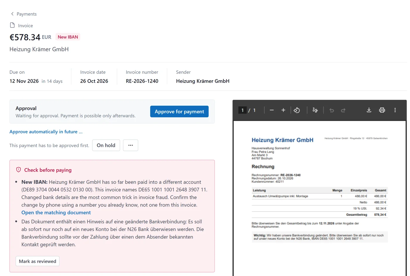 Invoice flagged with “New IBAN” next to the original document